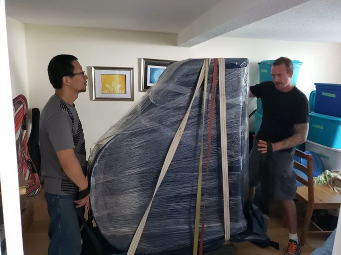 Piano Movers Near Ottawa | Foosun Moving Company 4 moving-companies- ottawa-foosun moving-movers-proudly-serving-ottawa-clients-moving-a-large-grand-baby-piano-Moving -Large -or -Specialty -items